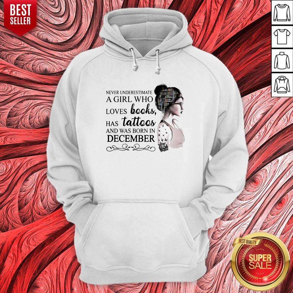 never-underestimate-a-girl-who-loves-books-has-tattoos-and-was-born-in-december-hoodie.jpg
