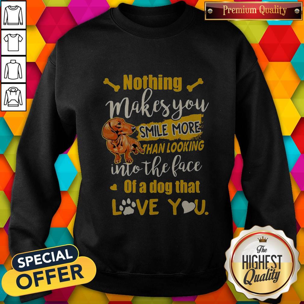 dachshund-nothing-makes-you-smile-more-than-looking-into-the-face-of-a-dog-that-love-you-heart-sweatshirt.jpg
