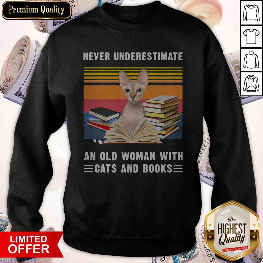 funny-never-underestimate-an-old-woman-with-cats-and-books-sphynx-cat-vintage-retro-sweatshirt.jpg