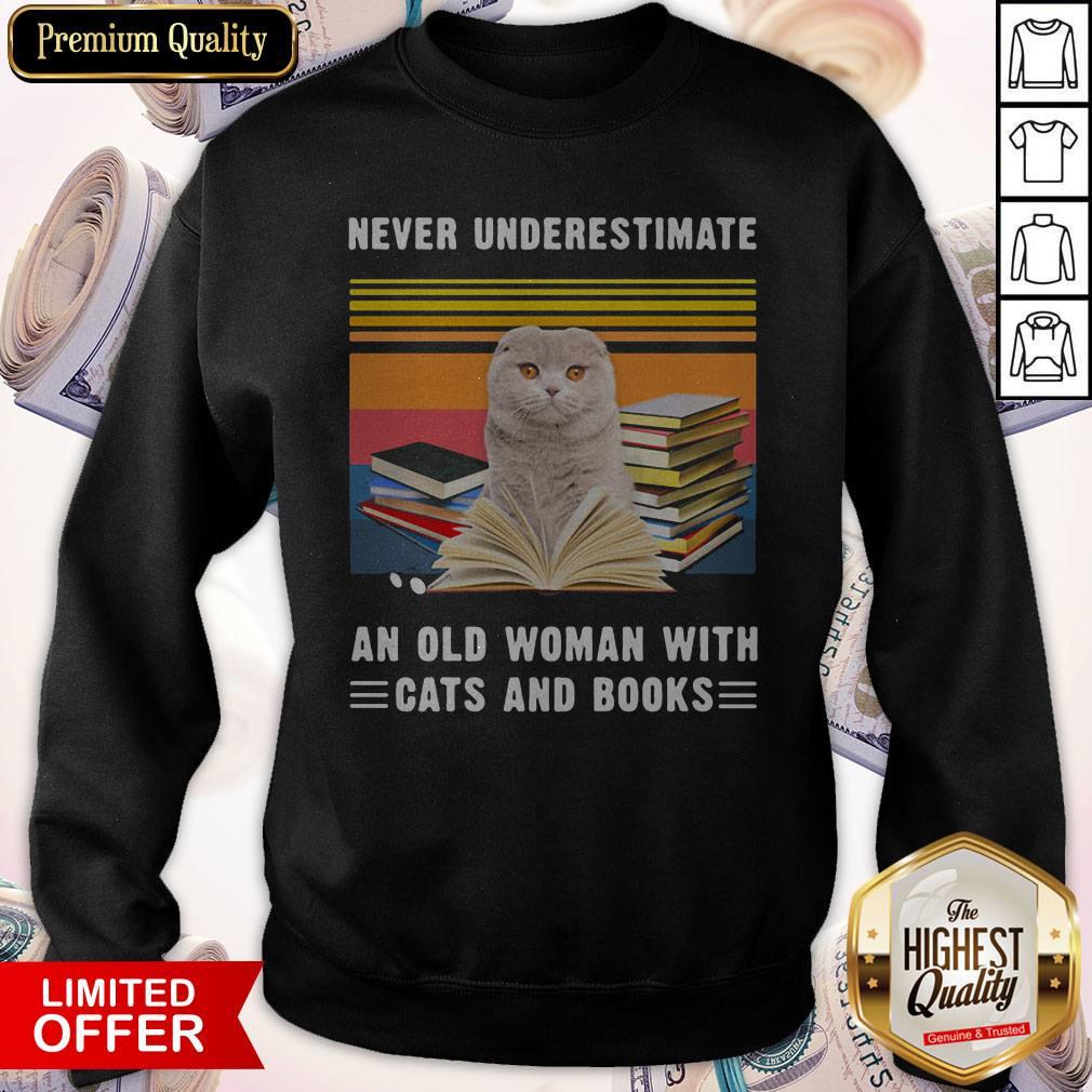 good-never-underestimate-an-old-woman-with-cats-and-books-scottish-fold-cat-vintage-retro-sweatshirt.jpg