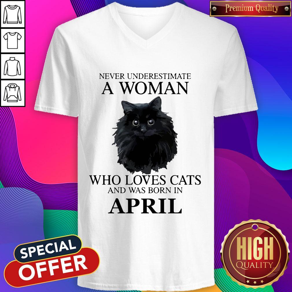 great-top-never-underestimate-a-woman-who-loves-cats-and-was-born-in-february-v-neck.jpg