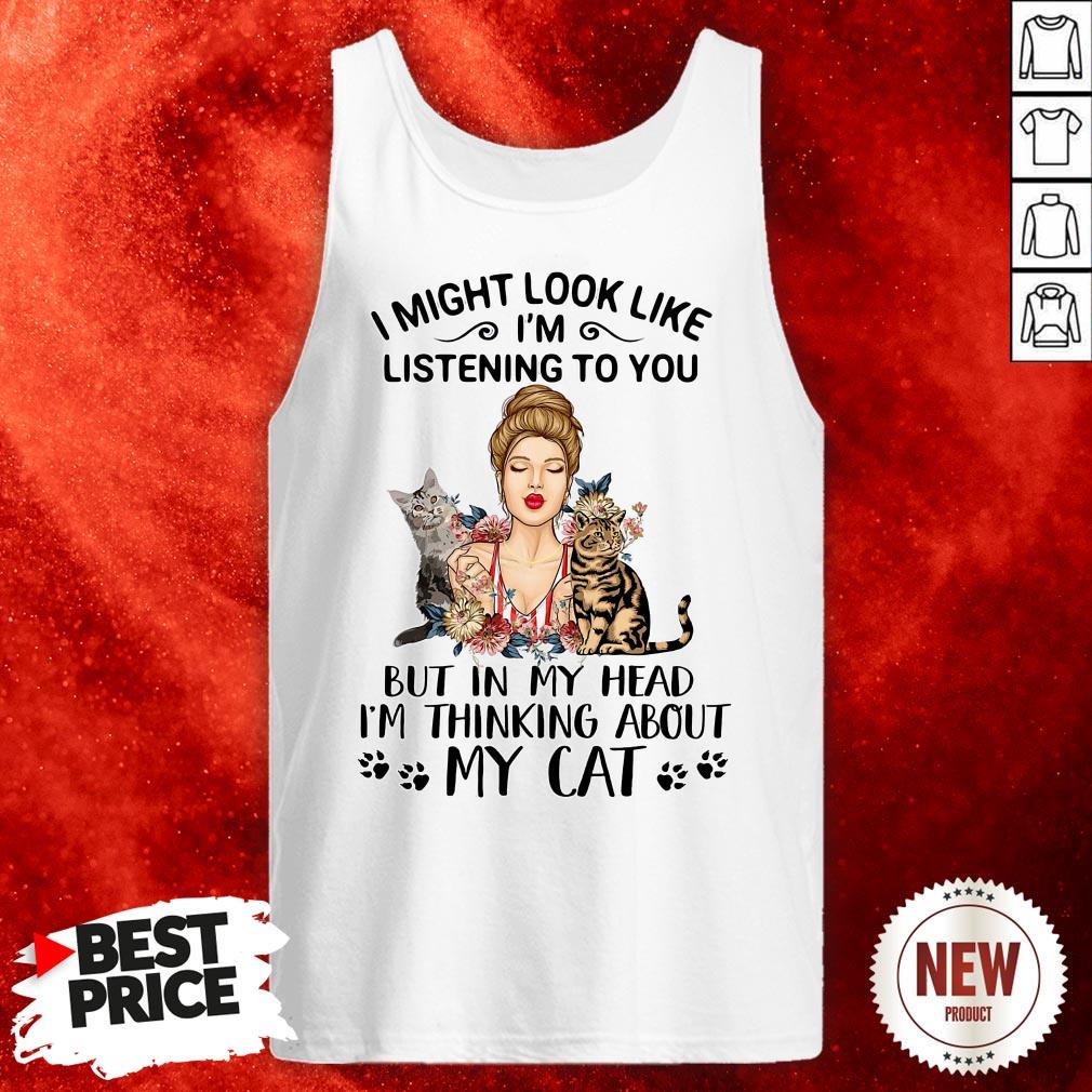official-i-might-look-like-im-listening-to-you-but-in-my-head-im-thinking-about-my-cat-tank-top.jpg