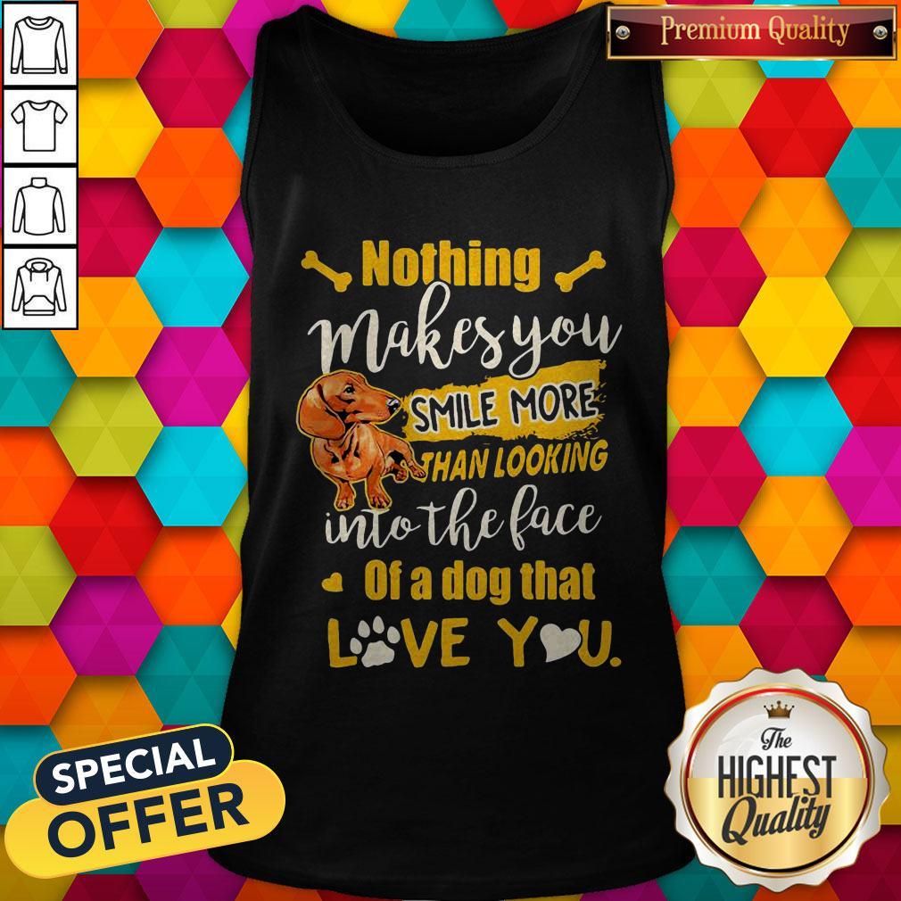 dachshund-nothing-makes-you-smile-more-than-looking-into-the-face-of-a-dog-that-love-you-heart-tank-top.jpg