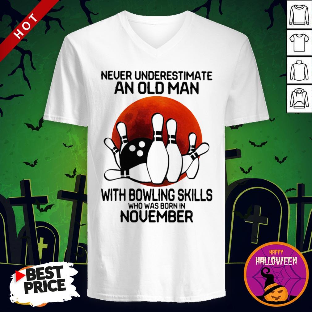 so-never-underestimate-an-old-man-with-bowling-skills-who-was-born-in-november-sunset-v-neck.jpg