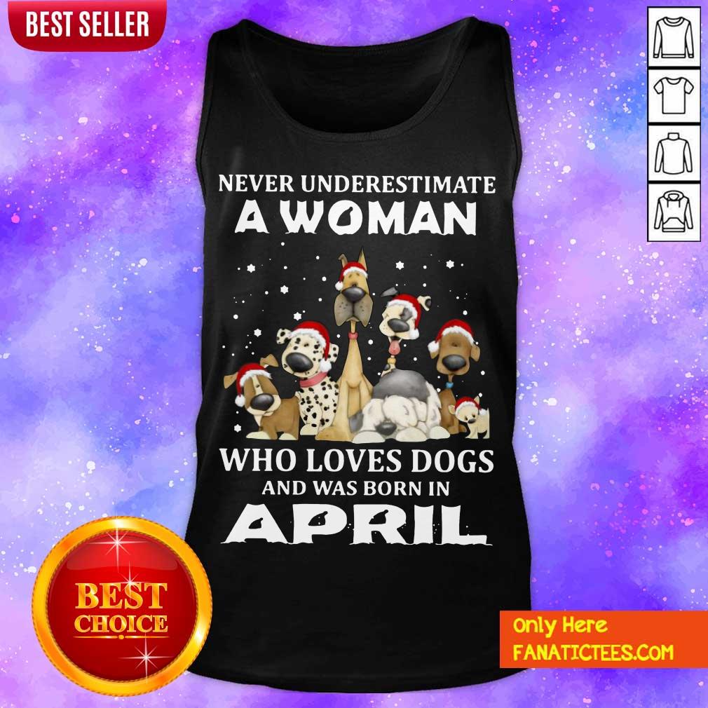 funny-never-underestimate-a-woman-who-loves-dogs-and-was-born-in-april-christmas-tank-top.jpg
