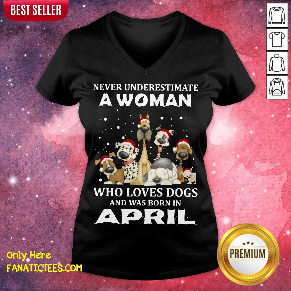funny-never-underestimate-a-woman-who-loves-dogs-and-was-born-in-april-christmas-v-neck.jpg