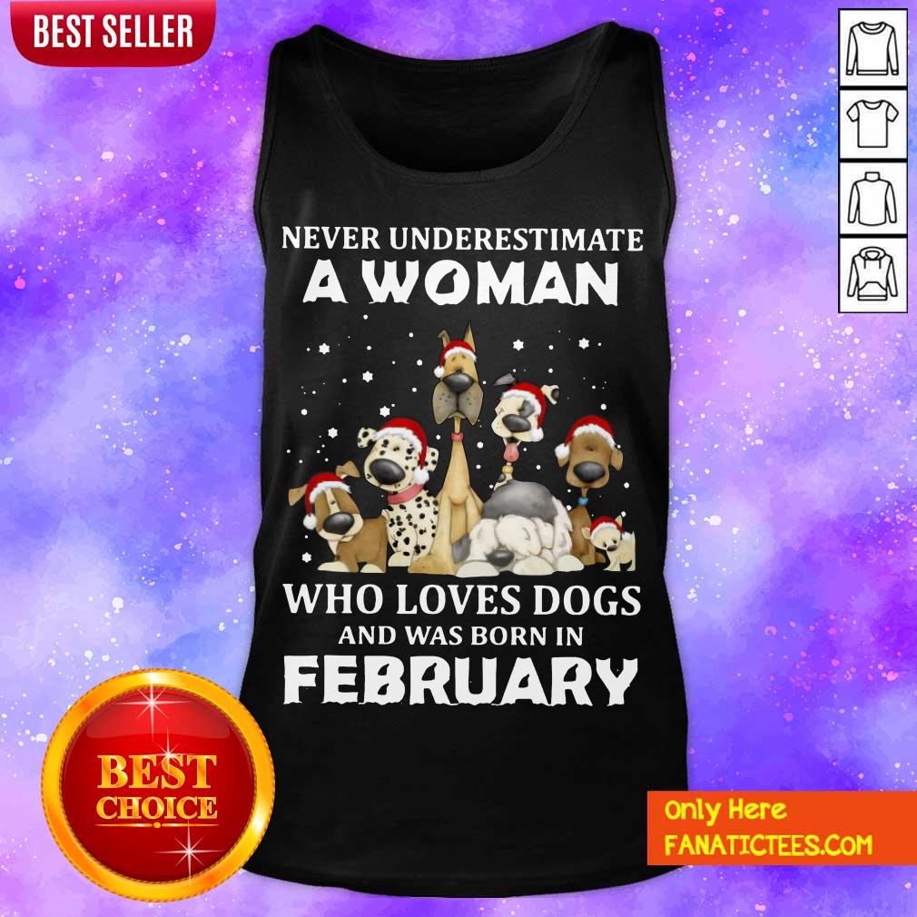 nice-never-underestimate-a-woman-who-loves-dogs-and-was-born-in-february-christmas-tank-top.jpg