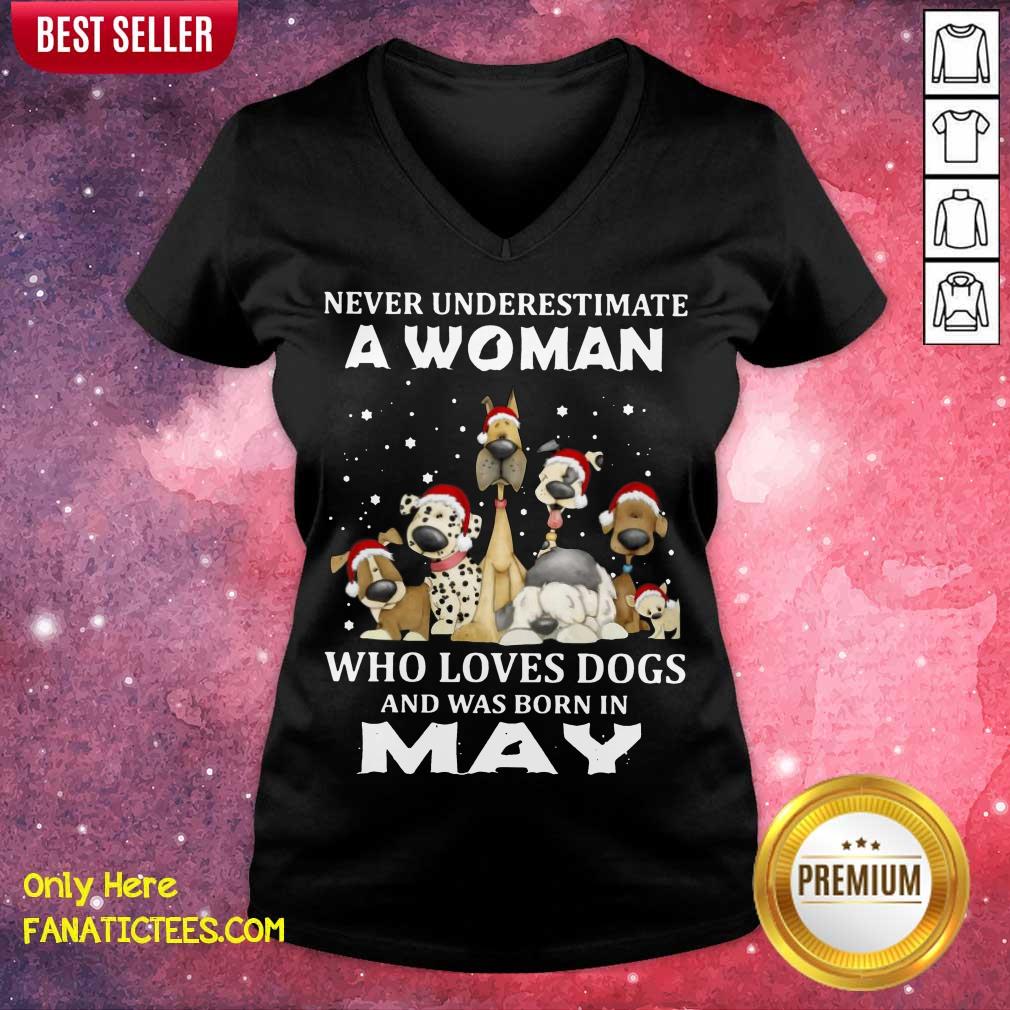 pretty-never-underestimate-a-woman-who-loves-dogs-and-was-born-in-may-christmas-v-neck.jpg