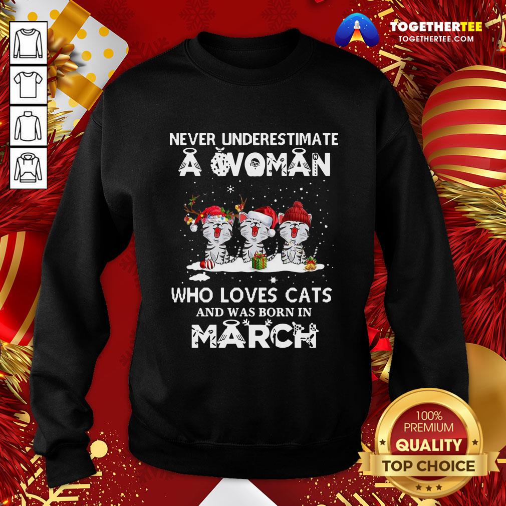 funny-never-underestimate-a-woman-who-loves-cats-santa-and-was-born-in-march-sweatshirt.jpg