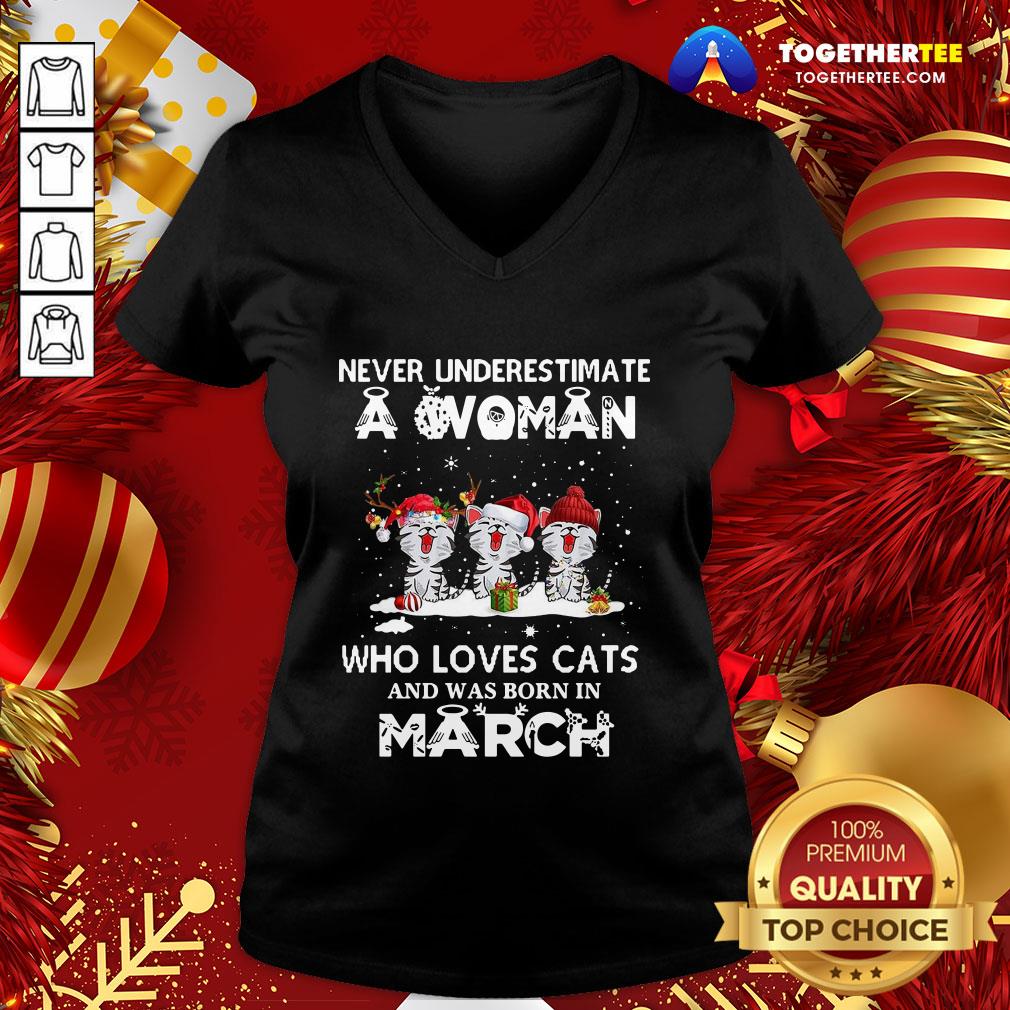 funny-never-underestimate-a-woman-who-loves-cats-santa-and-was-born-in-march-v-neck.jpg