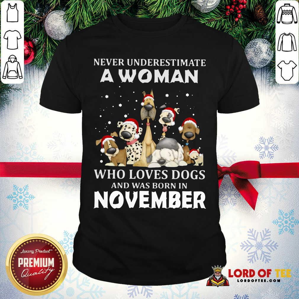 happy-never-underestimate-a-woman-who-loves-dogs-and-was-born-in-november-christmas-shirt.jpg