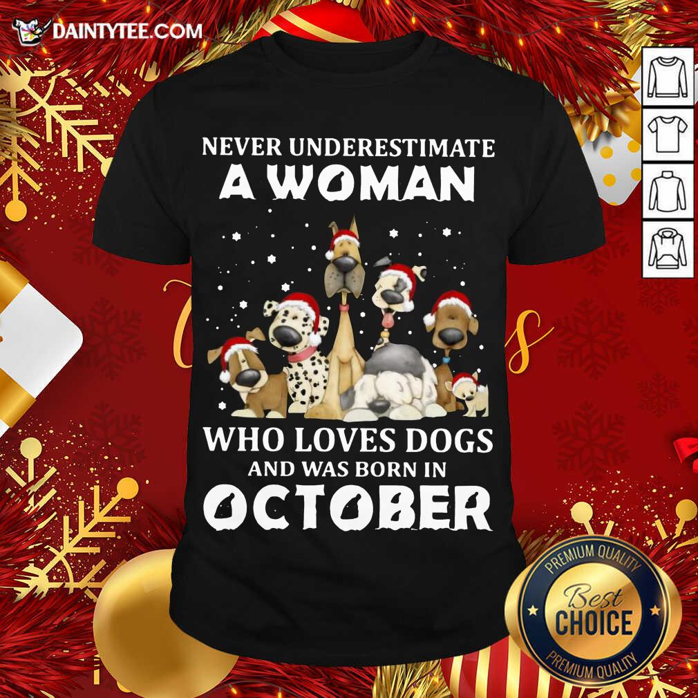 hot-never-underestimate-a-woman-who-loves-dogs-and-was-born-in-october-christmas-shirt.jpg