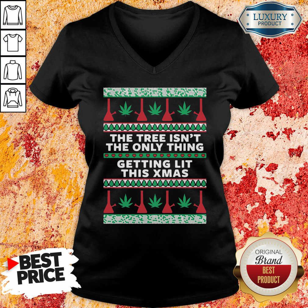 hot-the-tree-isnt-the-only-thing-getting-lit-ugly-stoner-christmas-v-neck.jpg