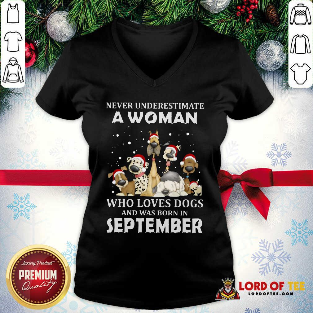 original-never-underestimate-a-woman-who-loves-dogs-and-was-born-in-september-christmav-neck.jpg