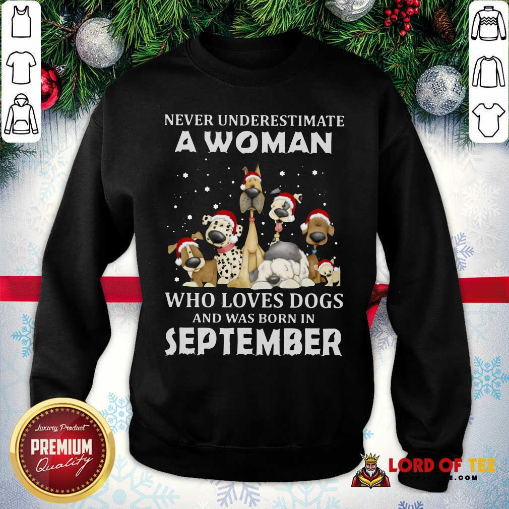 original-never-underestimate-a-woman-who-loves-dogs-and-was-born-in-september-chrisweatshirt.jpg