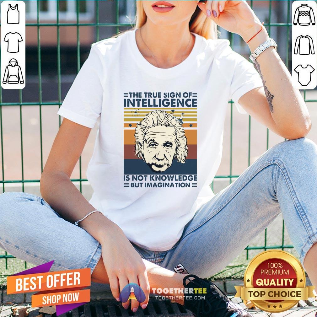 top-albert-einstein-the-true-sign-of-intelligence-v-neck.jpg