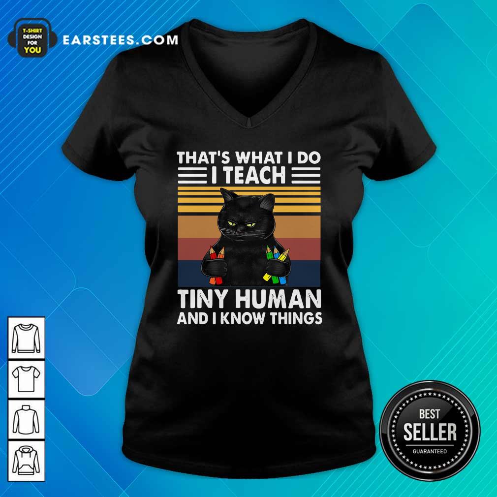 top-black-cat-thats-what-i-do-i-teach-tiny-human-and-i-know-things-vintage-v-neck.jpg