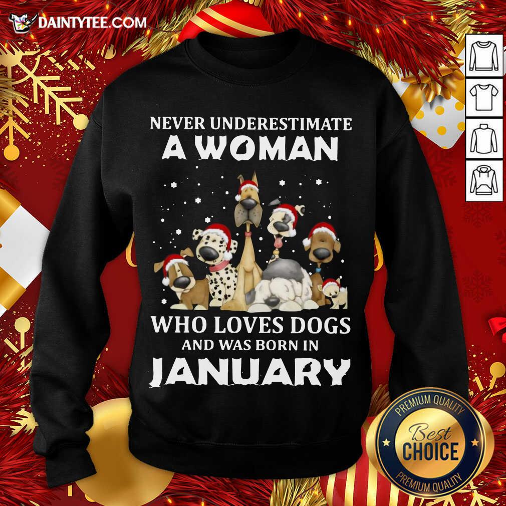 top-never-underestimate-a-woman-who-loves-dogs-and-was-born-in-january-christmas-sweatshirt.jpg