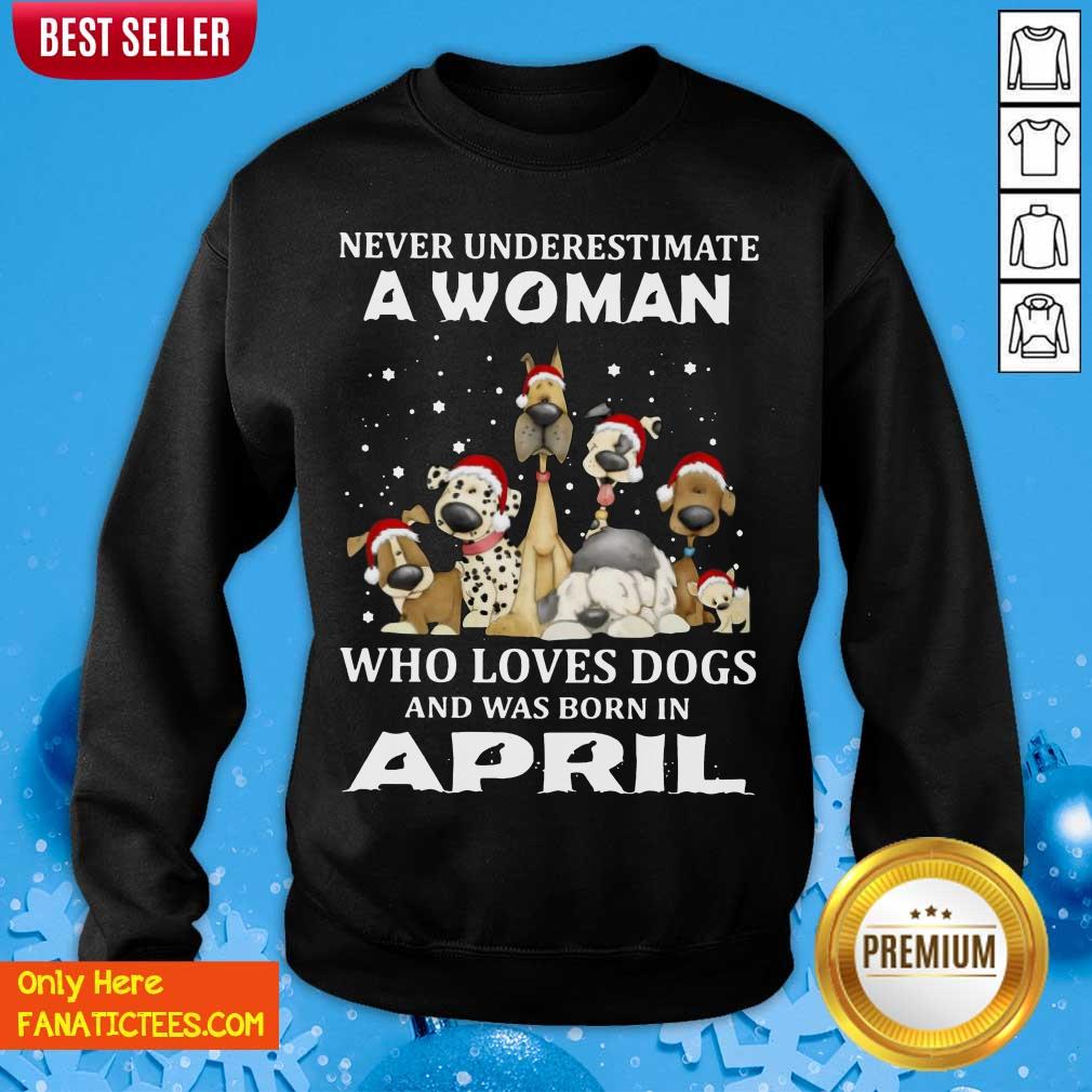 funny-never-underestimate-a-woman-who-loves-dogs-and-was-born-in-april-christmas-sweatshirt.jpg