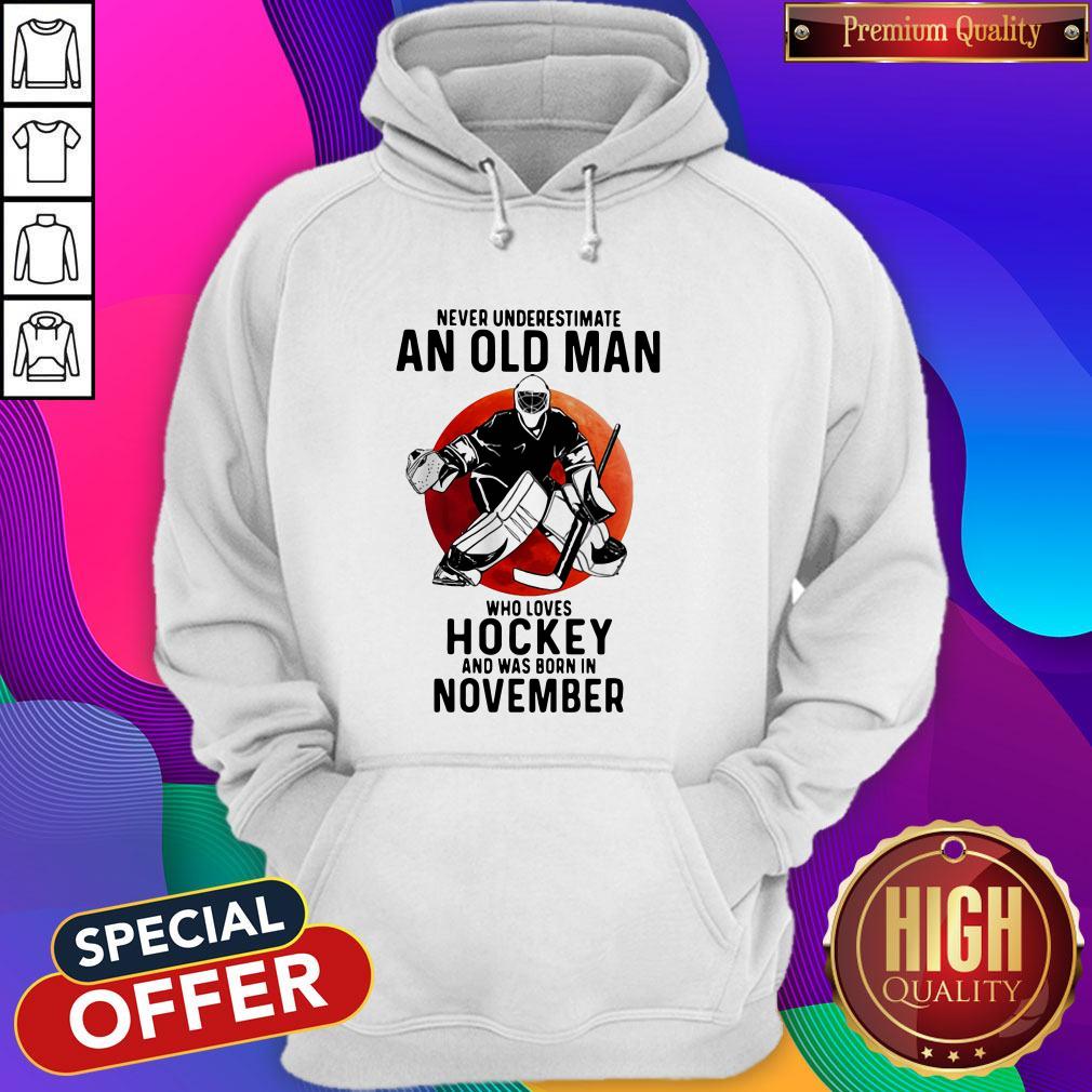 funny-never-underestimate-an-old-man-who-loves-hockey-and-was-born-in-november-sunset-hoodie.jpg