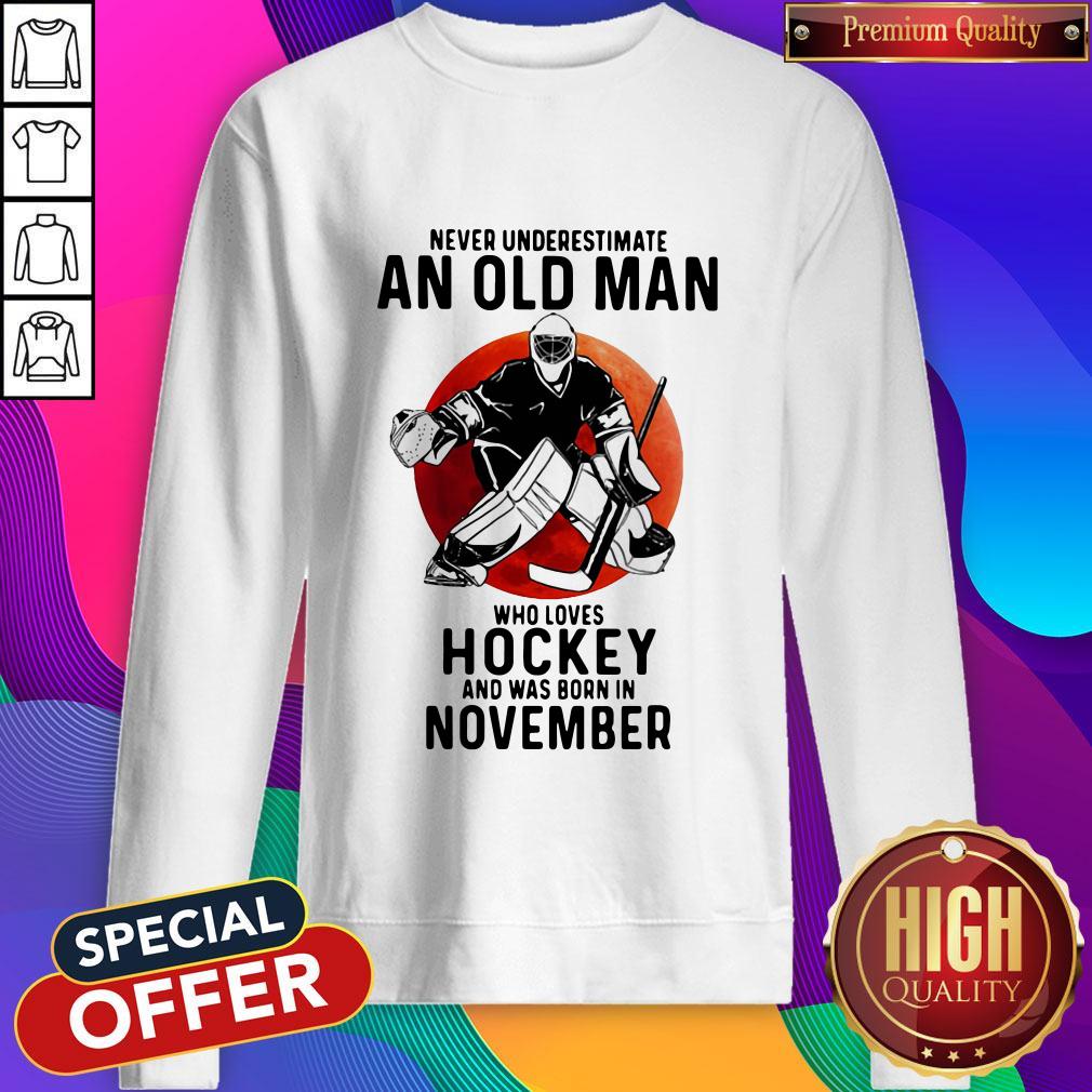funny-never-underestimate-an-old-man-who-loves-hockey-and-was-born-in-november-sunset-sweatshirt.jpg