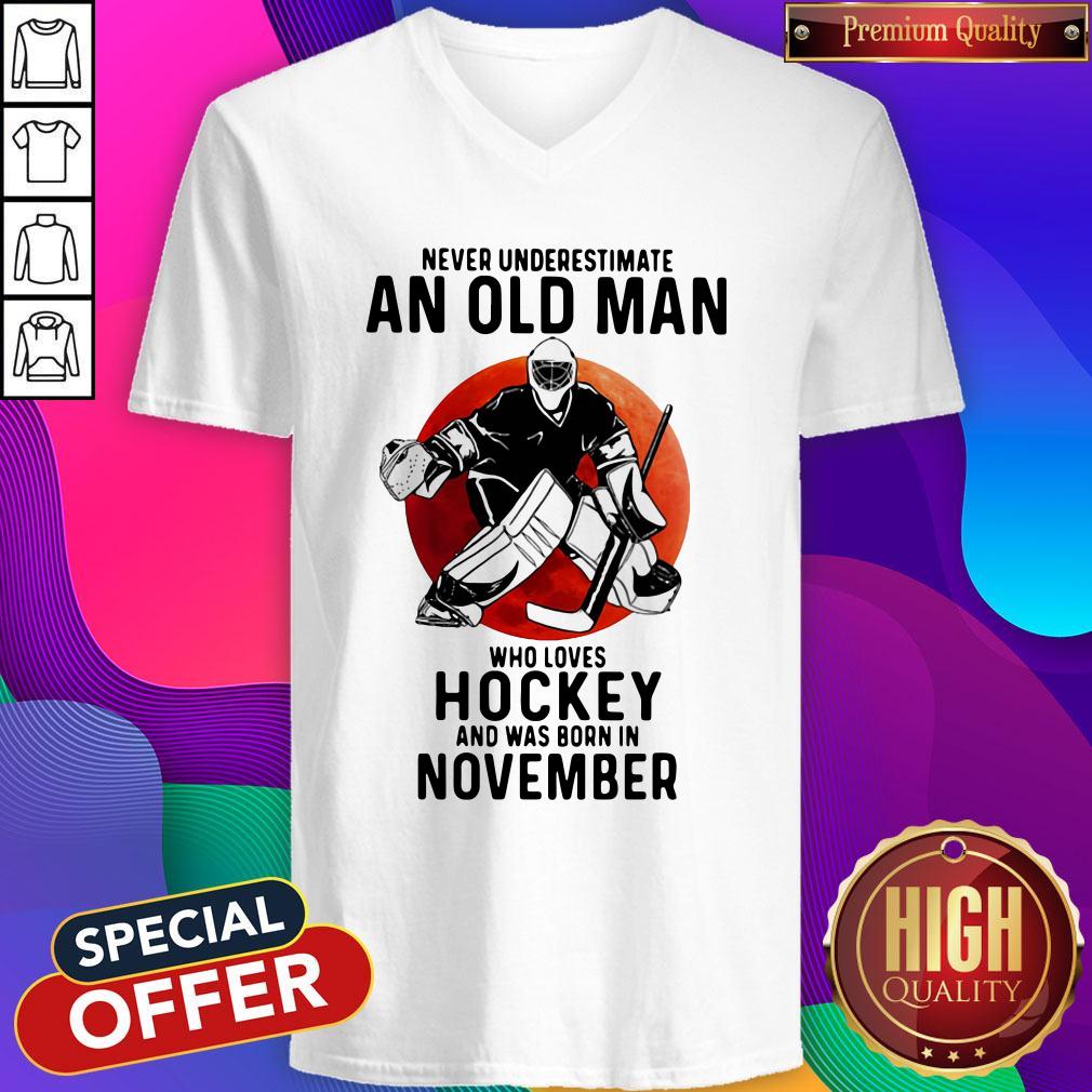 funny-never-underestimate-an-old-man-who-loves-hockey-and-was-born-in-november-sunset-v-neck.jpg