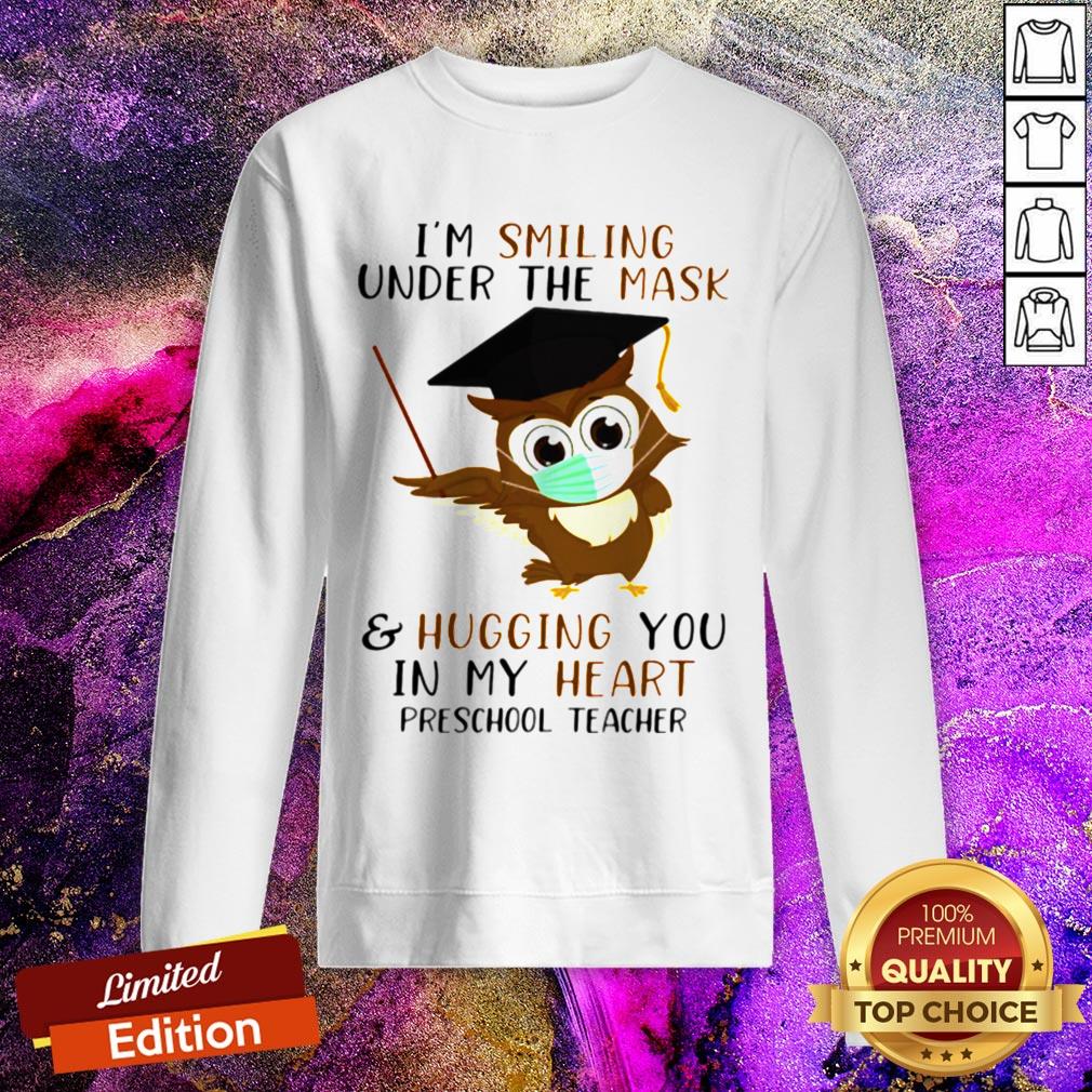 pro-im-smiling-under-the-mask-and-hugging-you-in-my-heart-preschool-teacher-sweatshirt.jpg