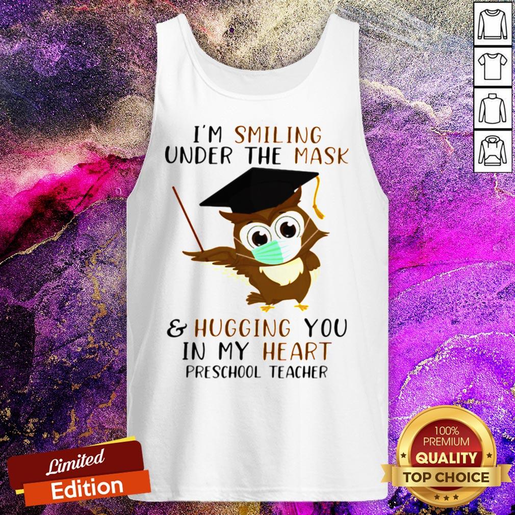 pro-im-smiling-under-the-mask-and-hugging-you-in-my-heart-preschool-teacher-tank-top.jpg