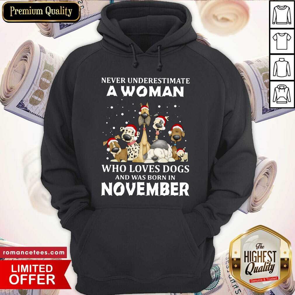nice-never-underestimate-a-woman-who-loves-dogs-and-was-born-in-august-christmas-hoodie.jpg
