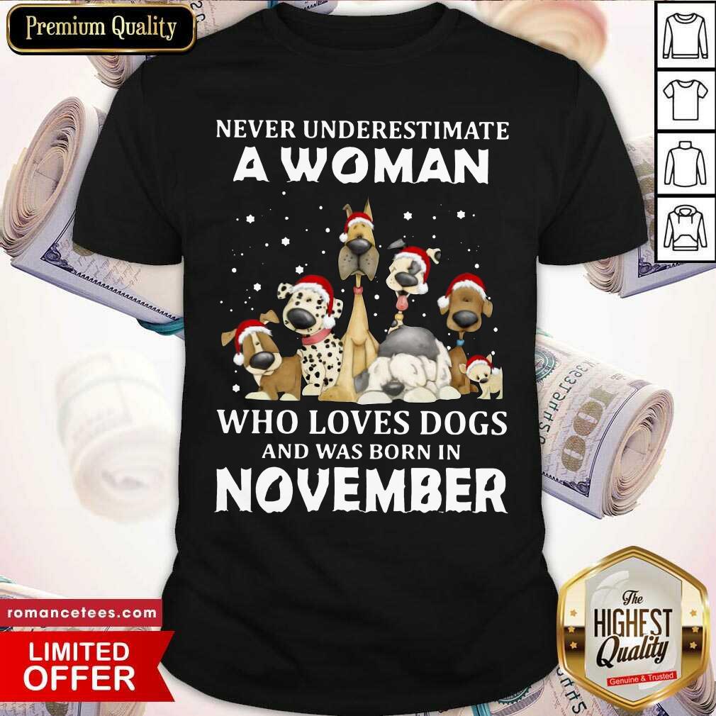nice-never-underestimate-a-woman-who-loves-dogs-and-was-born-in-august-christmas-shirt.jpg