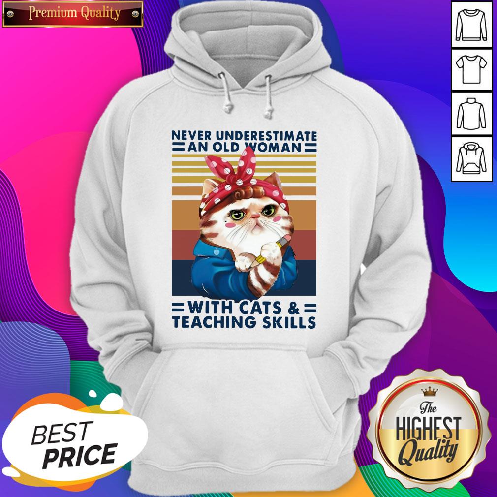 never-underestimate-an-old-woman-with-cats-and-teaching-skills-vintage-retro-hoodie.jpg
