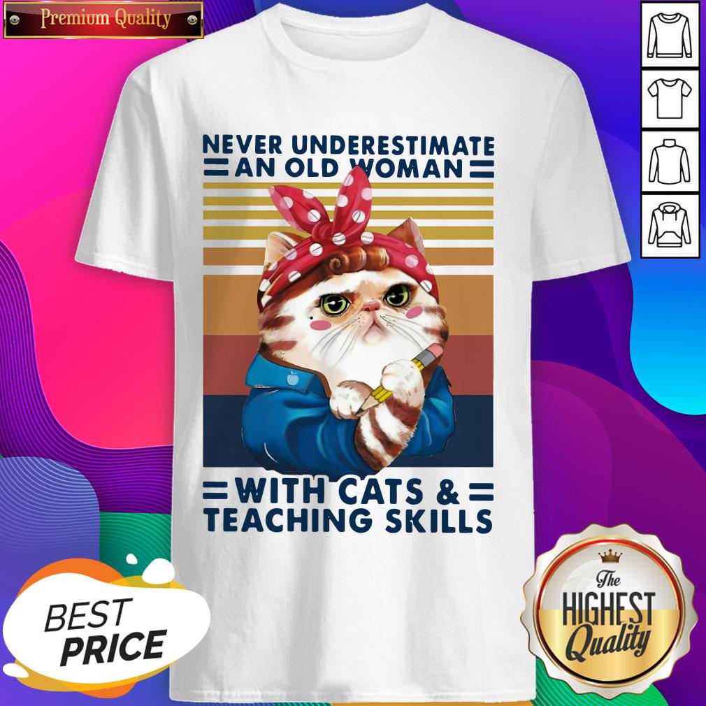 never-underestimate-an-old-woman-with-cats-and-teaching-skills-vintage-retro-shirt.jpg