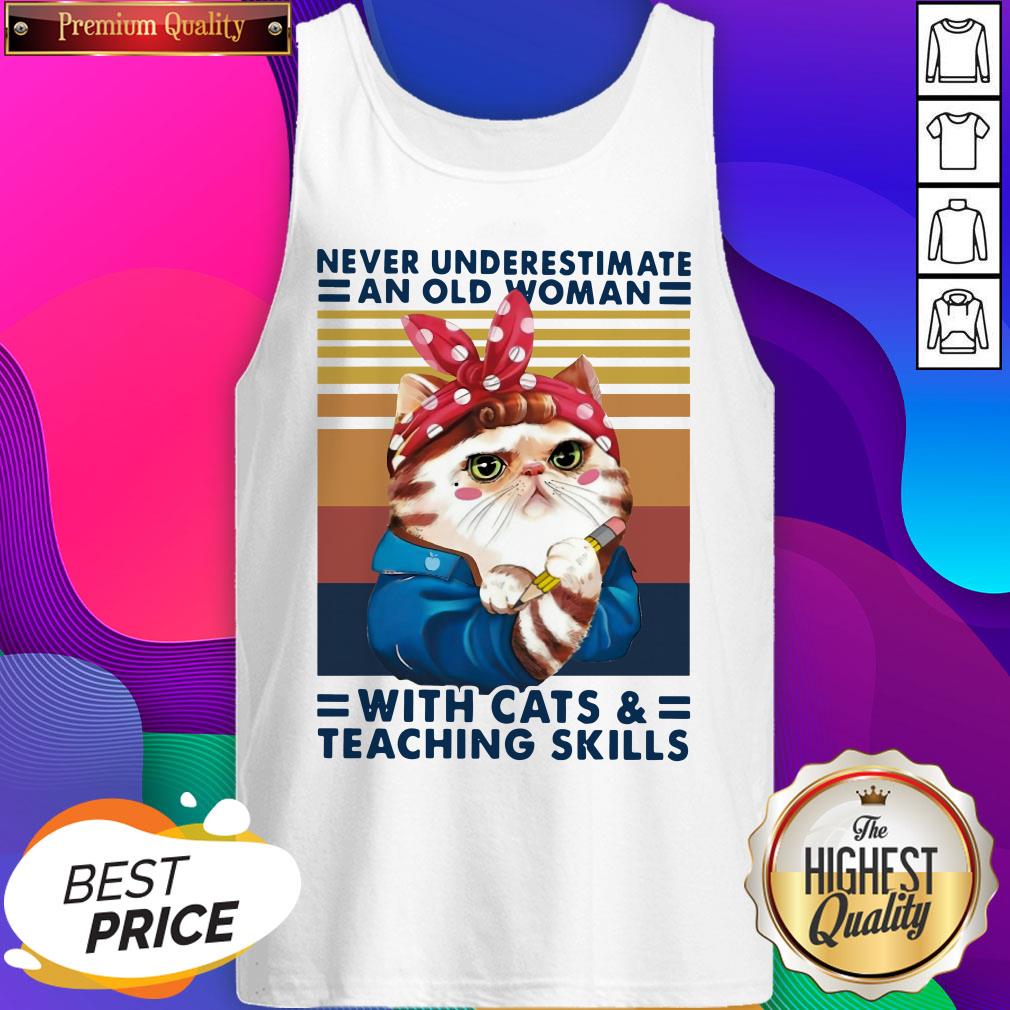 never-underestimate-an-old-woman-with-cats-and-teaching-skills-vintage-retro-tank-top.jpg