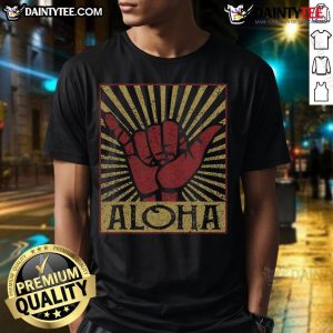 Vintage Aloha Hawaiian T-Shirt featuring vibrant tropical designs, perfect for summer and beachwear enthusiasts.