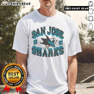 Alt Text: Premium San Jose Sharks Rink Arched Wordmark T-Shirt featuring team logo and vibrant colors for fans and collectors.