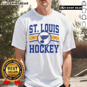 Vintage St Louis Blues Hockey Logo 1967 T-Shirt featuring iconic blue note design on a classic tee.