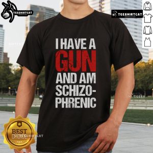 Top I Have A Gun And Am Schizophrenic T-Shirt featuring bold graphic text on a stylish casual tee.